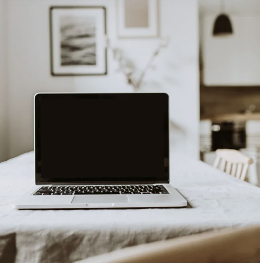 laptop on a table at home